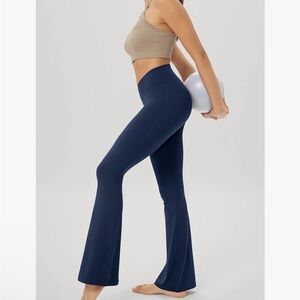 SUNYAA S NWOT Dark Teal Blue criss cross tummy control highrise flare leggings